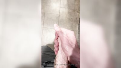 TheStepBrothers - Big bro shows his cock in the mirror in public bathroom - 48 secs - free gay porn