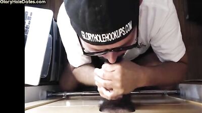 gloryhole amateur dilf sucking and tugging black cock