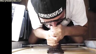 gloryhole amateur dilf sucking and tugging black cock