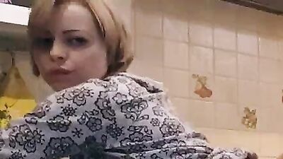 Sexy maid sucks and fucks on the kitchen and gets a massive cumload right in her tight pussy