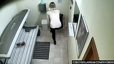 Blonde Girl Caught in Public Solarium