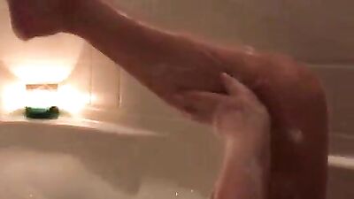 Teen Catherine Grey takes bubble bath