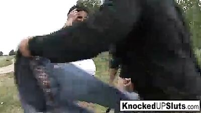 Knocked up slut takes care of a cock outdoors
