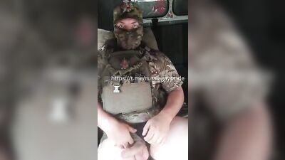 Russian soldier jerking his big cock