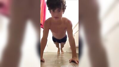 a fit hunk flexes his muscles - free gay porn