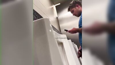 young guy with thick cut dick pissing at urinal - free gay porn
