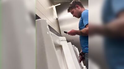 young guy with thick cut dick pissing at urinal - free gay porn