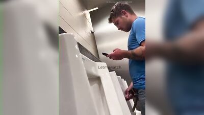 young guy with thick cut dick pissing at urinal - free gay porn