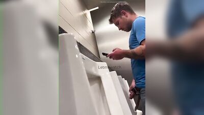 young guy with thick cut dick pissing at urinal - free gay porn
