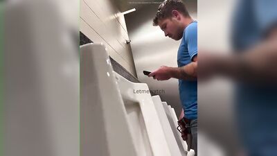 young guy with thick cut dick pissing at urinal - free gay porn