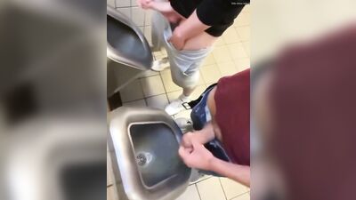 two friends jack off and cum at the bathroom urinals - free gay porn