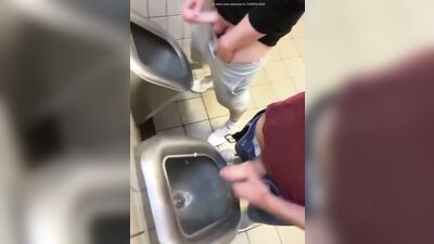 two friends jack off and cum at the bathroom urinals - free gay porn