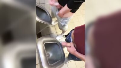 two friends jack off and cum at the bathroom urinals - free gay porn
