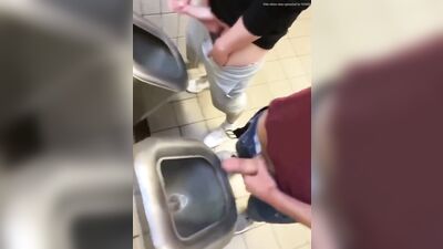 two friends jack off and cum at the bathroom urinals - free gay porn
