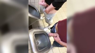 two friends jack off and cum at the bathroom urinals - free gay porn