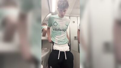 hot fit twink in soccer shirt pulling out his cock - free gay porn