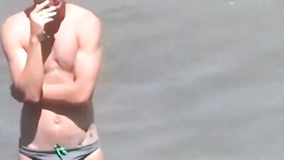 speedo beach boy with boner - free gay porn