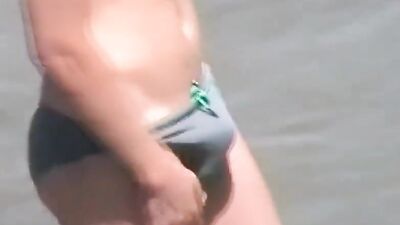 speedo beach boy with boner - free gay porn