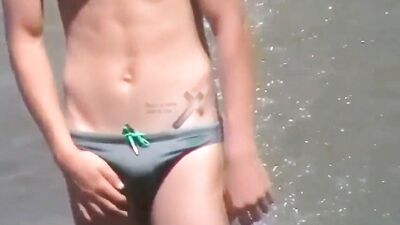 speedo beach boy with boner - free gay porn