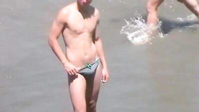 speedo beach boy with boner - free gay porn