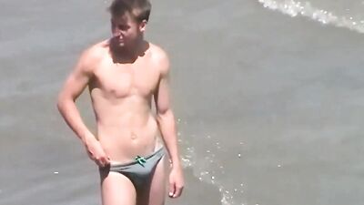 speedo beach boy with boner - free gay porn