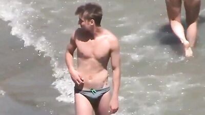 speedo beach boy with boner - free gay porn