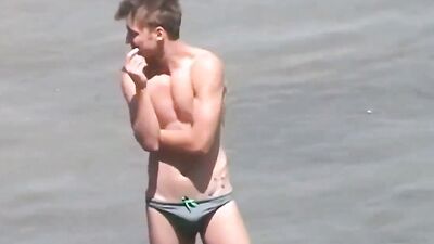 speedo beach boy with boner - free gay porn