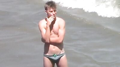 speedo beach boy with boner - free gay porn