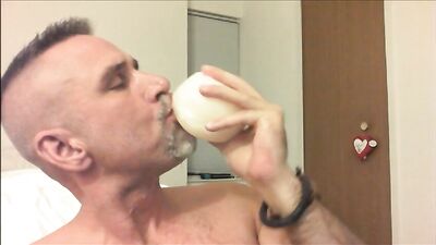 faggot cowboy sucking on a ball of frozen horse cum - free gay porn