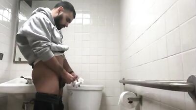 caught pissing with a boner in the work restroom on hidden camera - free gay porn