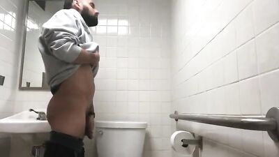 caught pissing with a boner in the work restroom on hidden camera - free gay porn