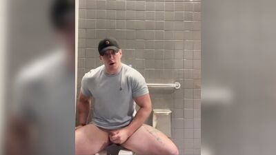hunk jerking off in public bathroom - free gay porn