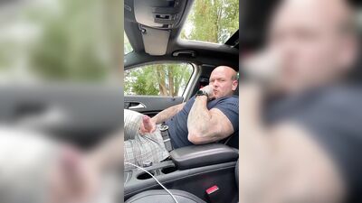 bull daddy skinhead jacks off in car - free gay porn