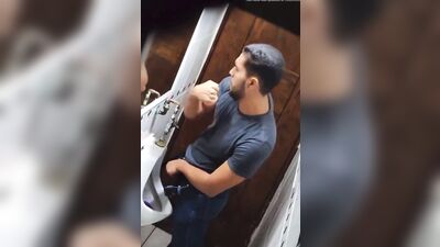 sexy man is taking a piss - free gay porn