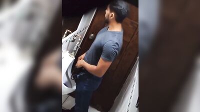 sexy man is taking a piss - free gay porn