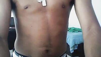 cute brown boy with a hard on - free gay porn