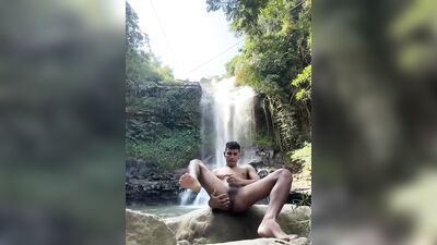 Gregory - Latino guy with huge cock masturbates under a waterfall