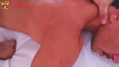 A muscular masculine male gives pleasure to his bottom
