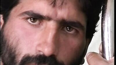 A hairy and bearded Turkish man with a big